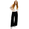 A woman wearing women's linen pants in black