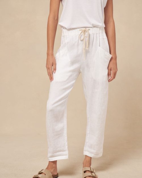 A woman wearing a pair of women;s linen pants